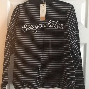 Medium black with white stripes sweater. NWT